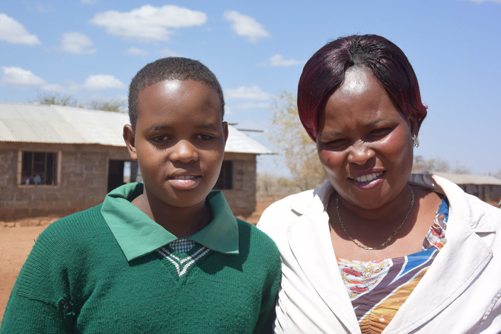 Teacher Mary Kapoto and a Masai girl. 
